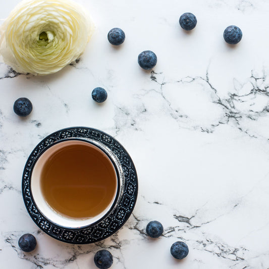 Blueberry Black Tea Cup with Flowers and Berries